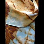 Blue and rust colored silk crepe scarf
